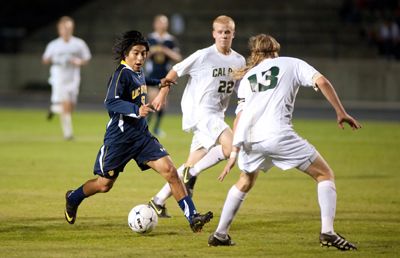 <strong>SCOTT ROEDER |</strong> Staff Photographer<br>Senior Irving Garcia weaves his way through the Mustang defense. He leads the team with seven goals.