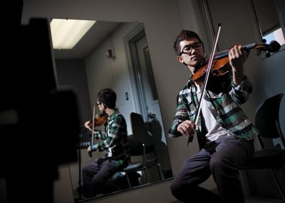MusicDepartmentColor <strong>BRANDON WONG |</strong> Staff Photographer<br>Next year, music major Andy Chen’s private violin lessons will go from free to $450 per quarter.
