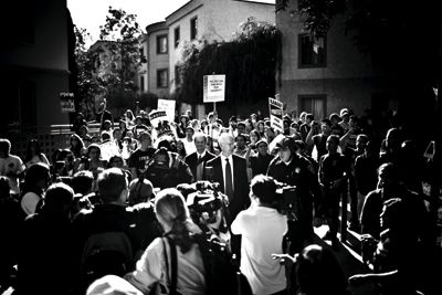 <strong>BRANDON WONG |</strong> Staff Photographer<br>Protesters surround Regent Bruce B. Darling as he tries to leave after attending a meeting at UCLA.