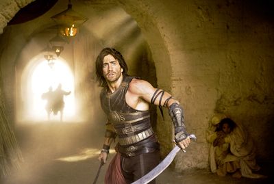 COURTESY OF WALT DISNEY PICTURES A ripped Jake Gyllenhaal prepares to cut his way through his enemies and jump across buildings in this adaptation of the video game series.