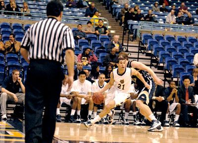 MensBballGilbertoCardenasStaff