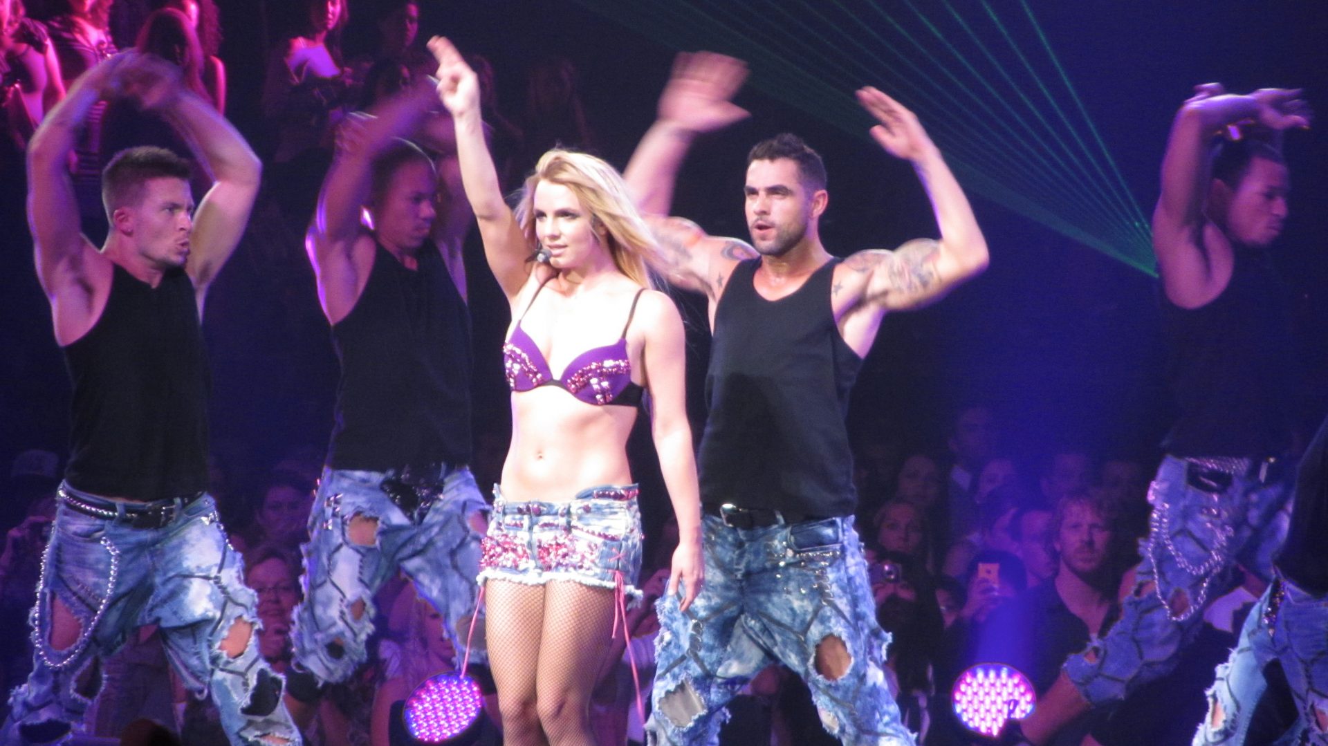 Britney Spears performing with background dancers
