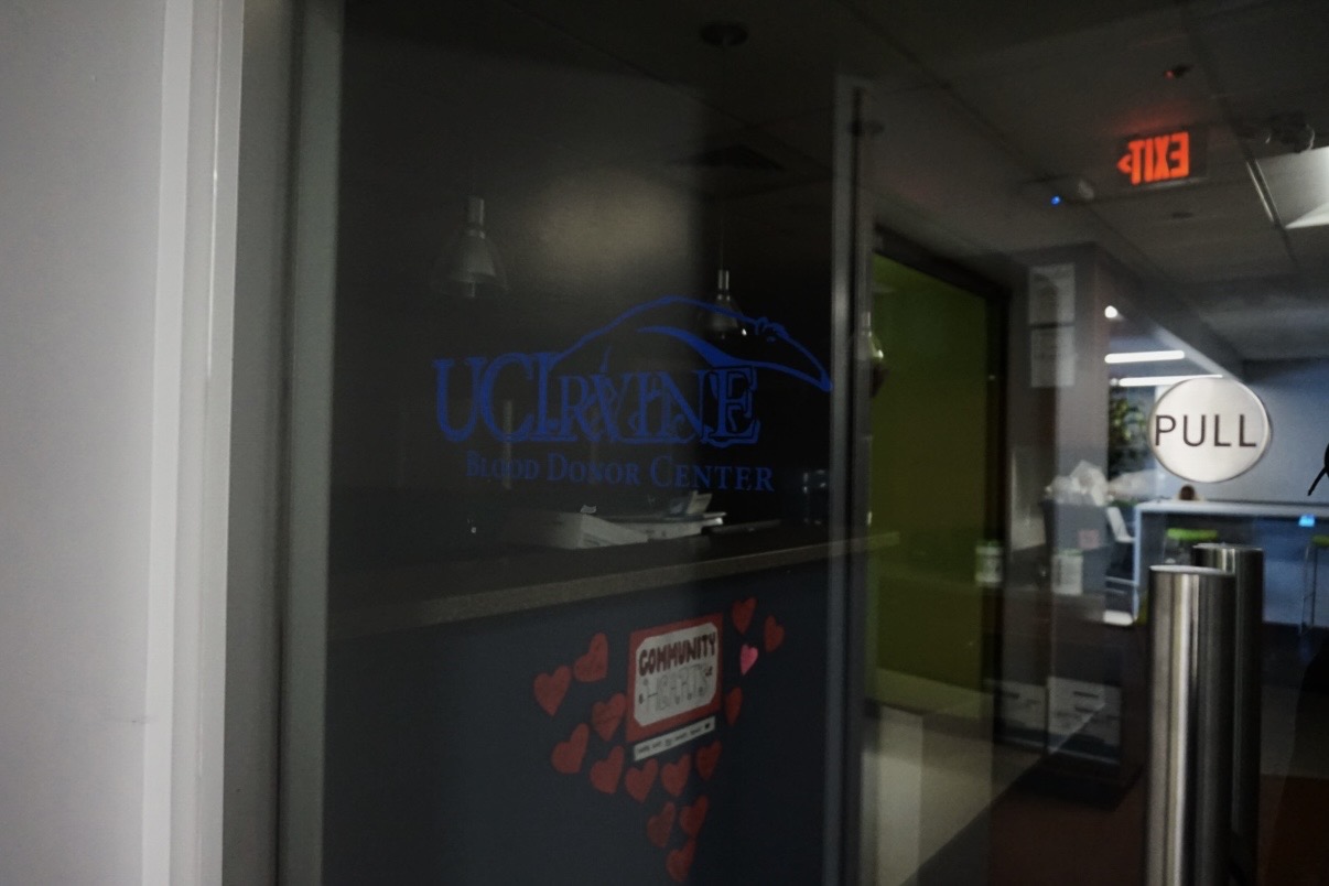 Glass door has UC Irvine Blood Donor Center